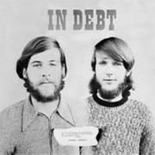 in debt